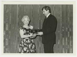 Dr. Desmond receives the Baylor Medical Alumni Association Distinguished Faculty Award from Dr. J...