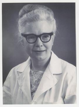 Portrait of Dr. Desmond wearing a lab coat